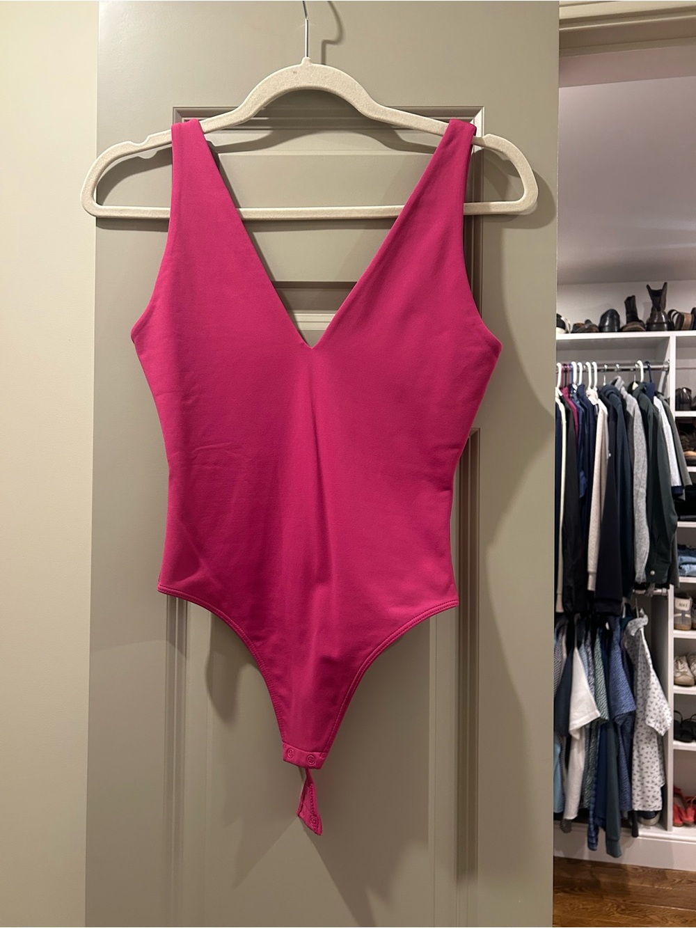 Babaton Hot Pink V‑Neck One Piece Bodysuit